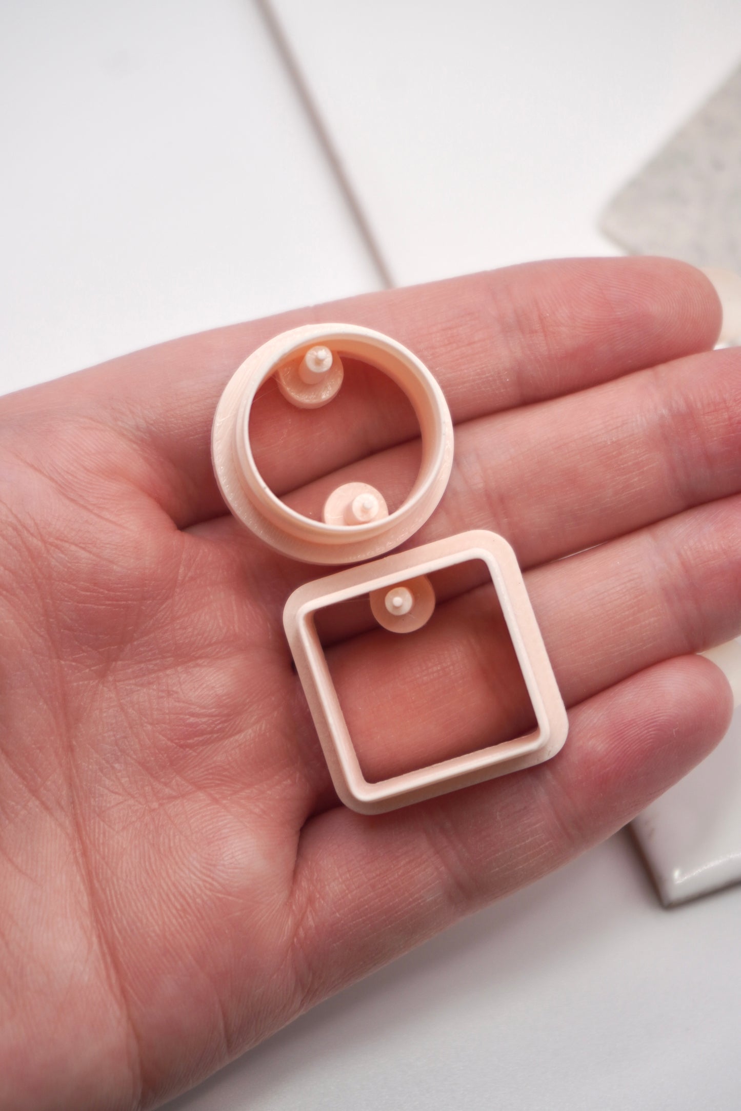 Circle and square with drill holes