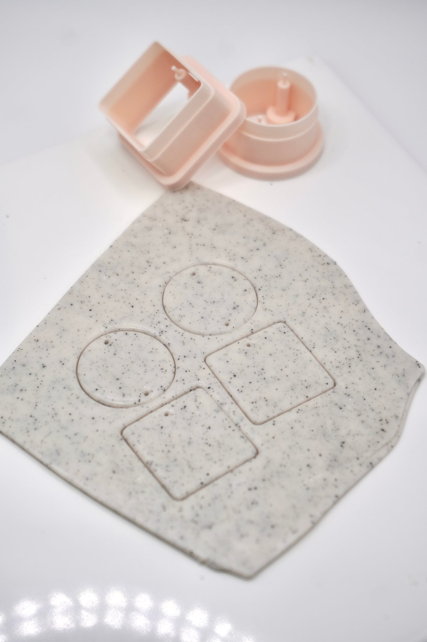 Circle and square with drill holes