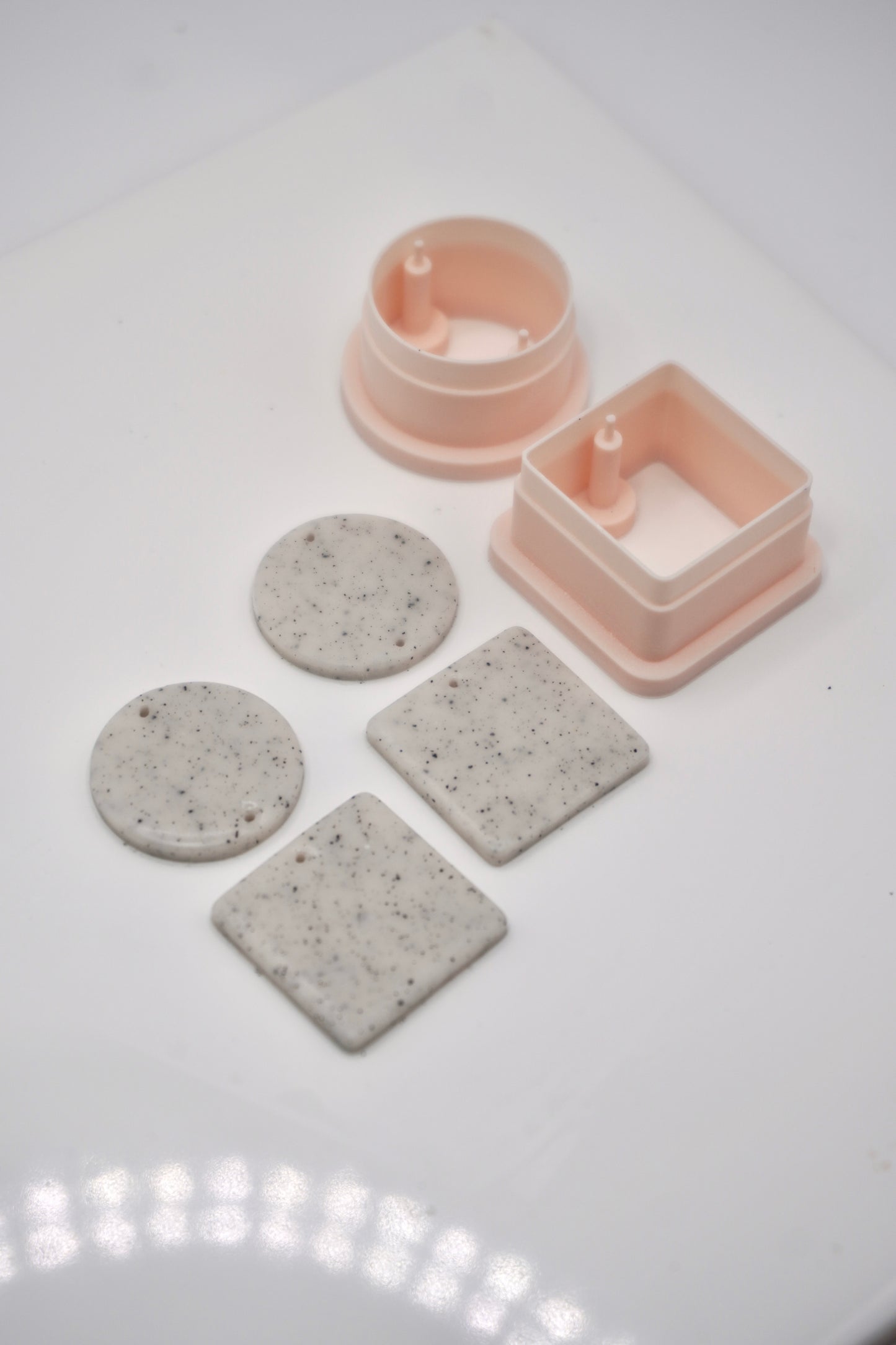 Circle and square with drill holes