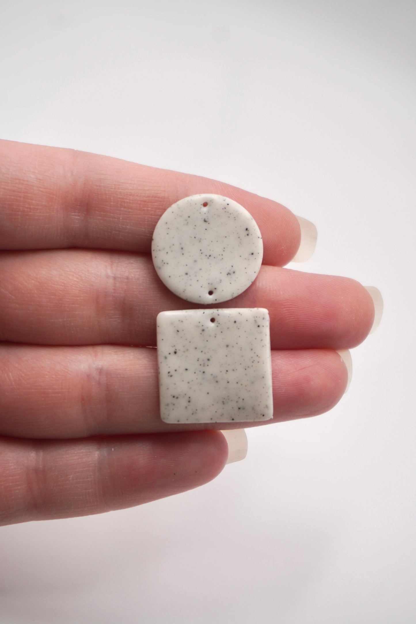 Circle and square with drill holes