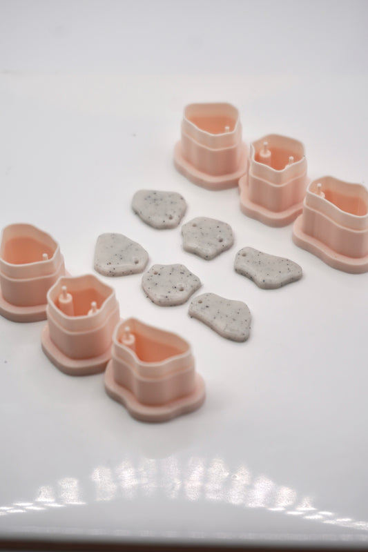 Tiny organic dangle with drill holes